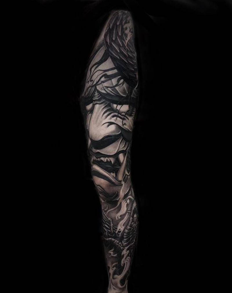 大般若花腿纹身图片_腿部新传统欧美写实纹身图案