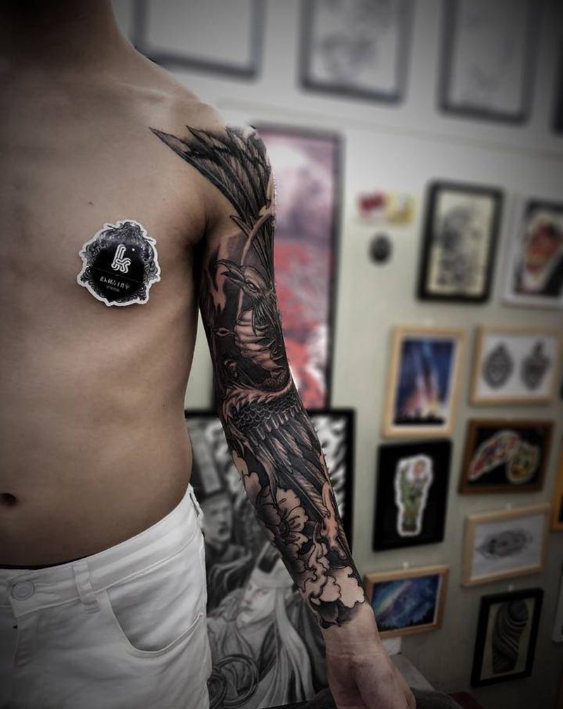 凤凰花臂纹身图片_手臂欧美写实新传统纹身图案