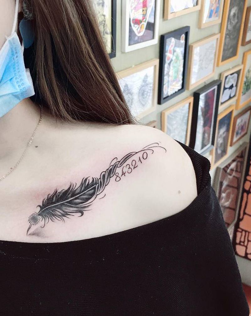 锁骨羽毛纹身图片_肩部胸部纹身图案