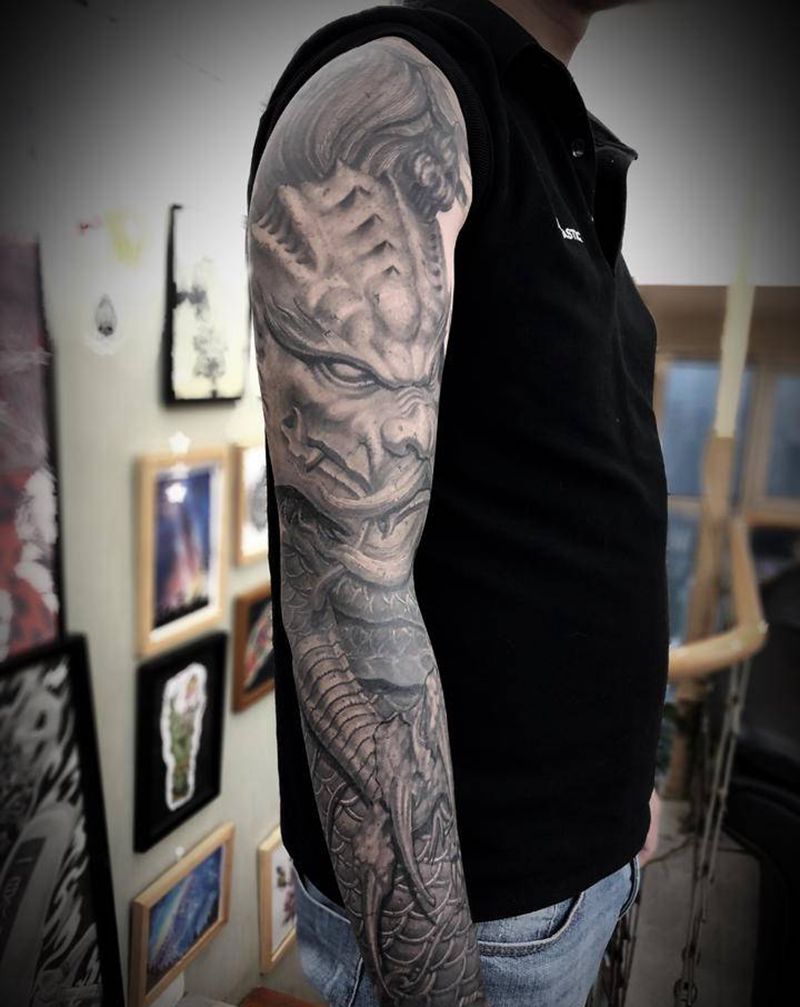 石雕臂 未完纹身图片_手臂欧美写实新传统纹身图案