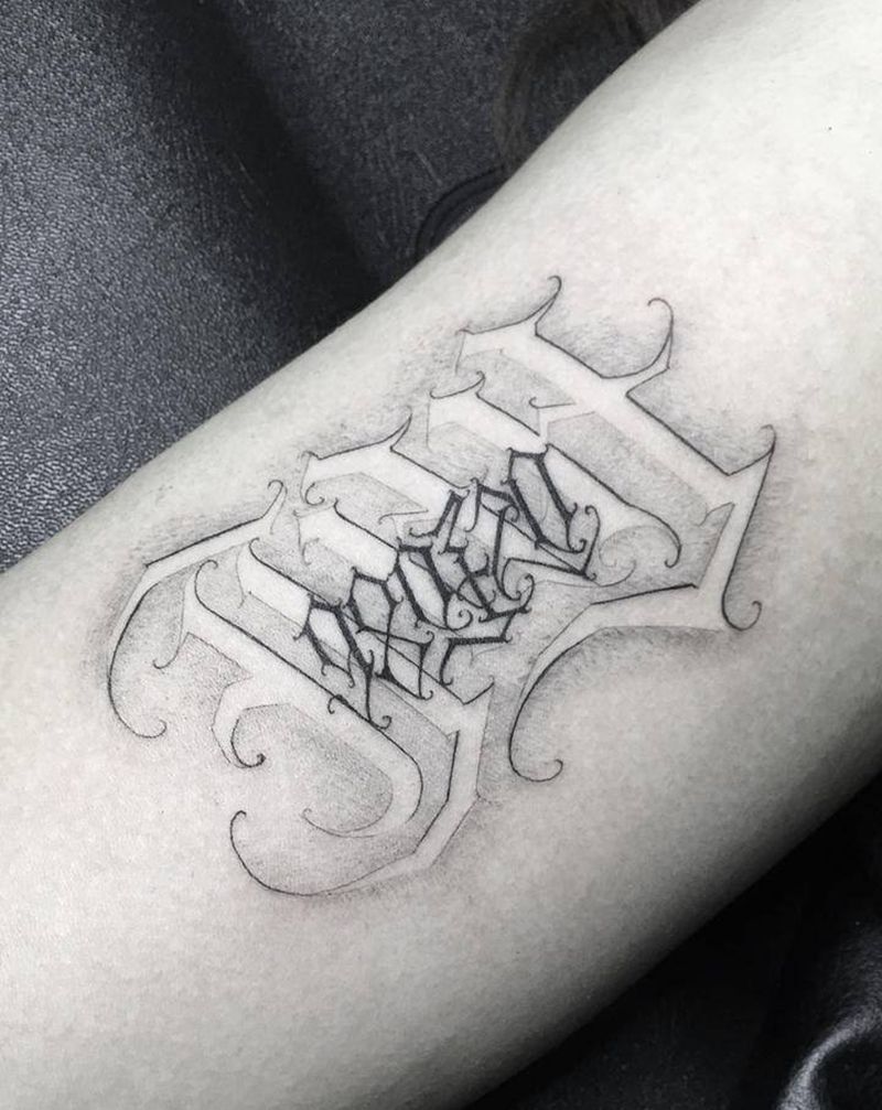 花体字纹身图片_手臂花体字纹身图案