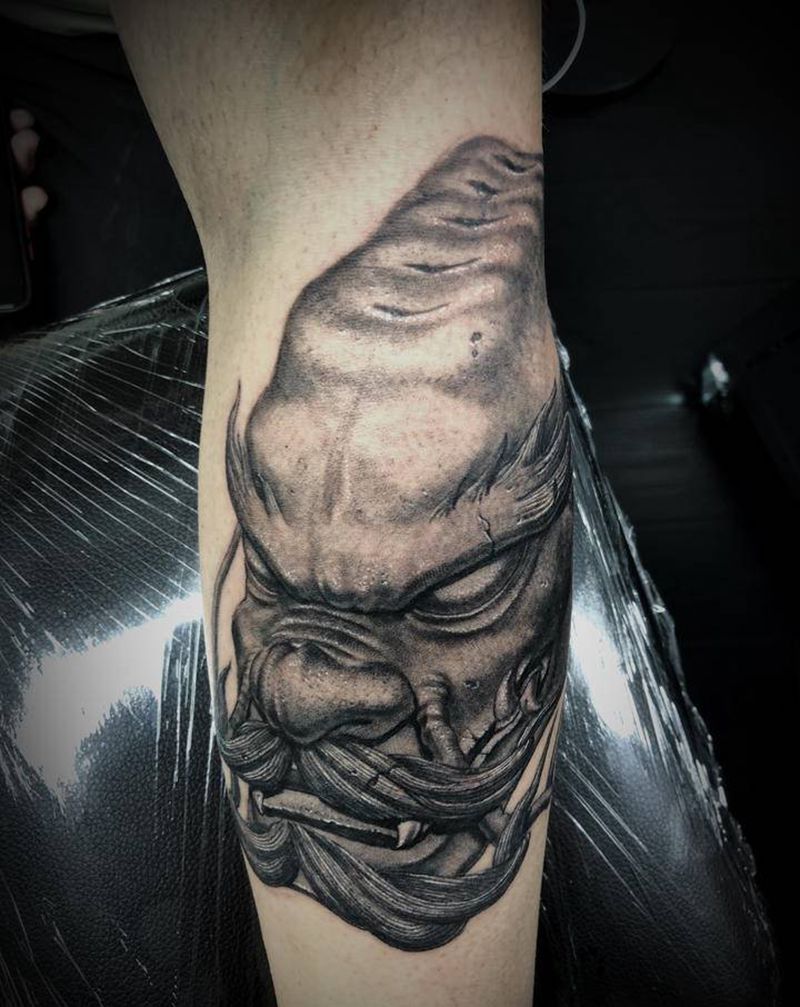 石雕龙纹身图片_手臂欧美写实新传统石雕纹身图案