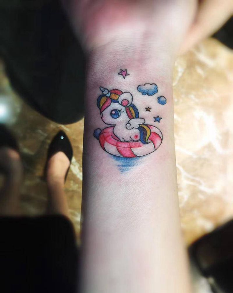 可爱独角兽纹身图片_手臂水彩纹身图案
