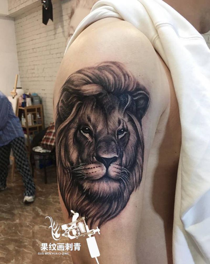 狮子纹身图片_手臂欧美写实纹身图案