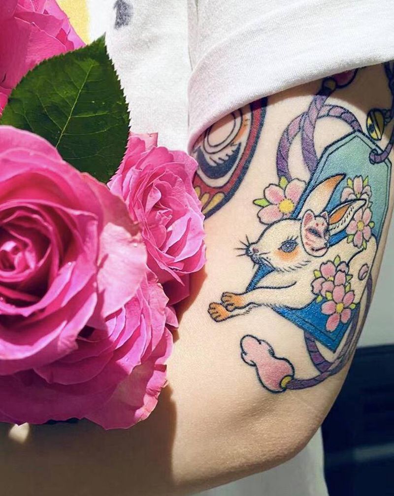 兔子御守纹身图片_手臂新传统水彩御守兔子彩色纹身图案