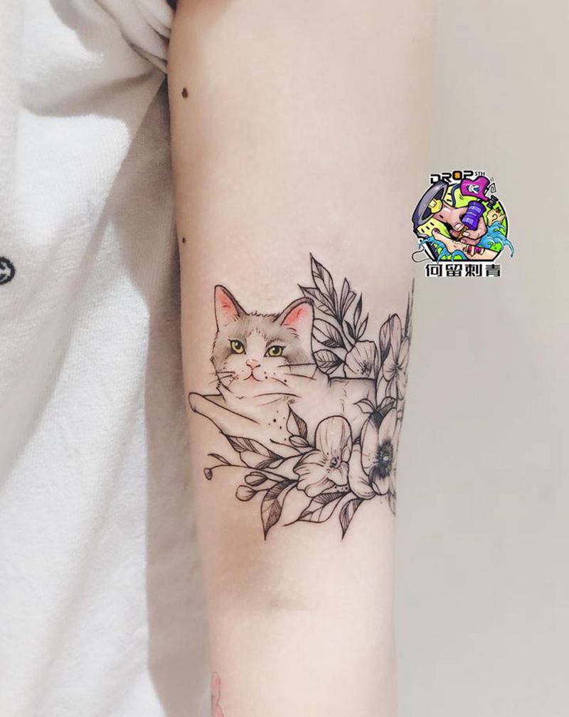客人的猫纹身图片_手臂纹身图案