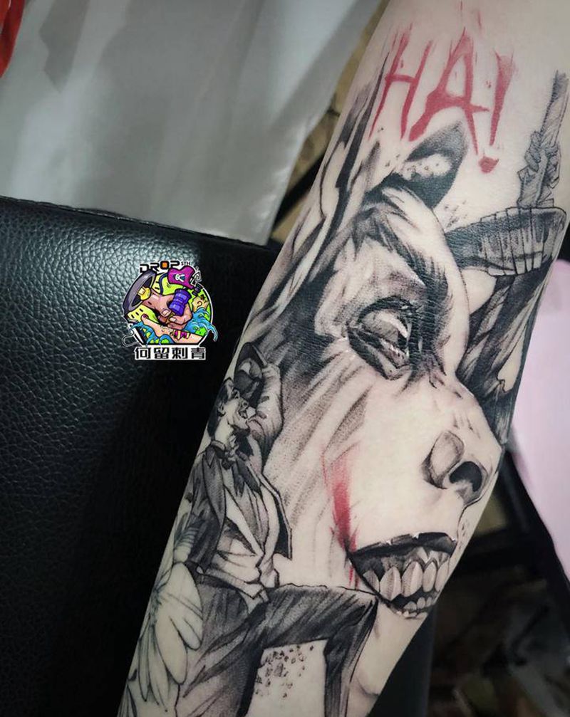小丑与猫女纹身图片_手臂欧美写实纹身图案