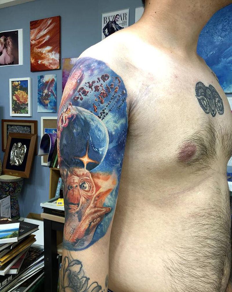 宇宙星球遮盖纹身图片_手臂欧美写实纹身图案