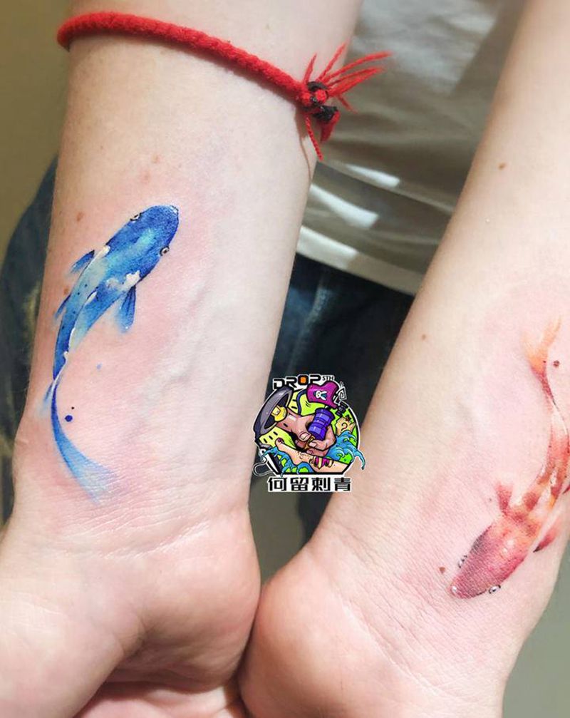 双鱼纹身图片_手臂水彩纹身图案