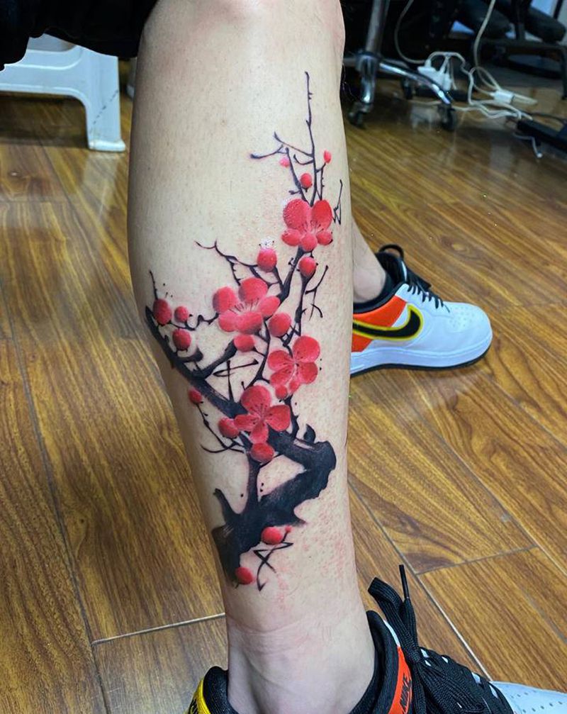 梅花纹身图片_腿部水墨寒梅纹身图案
