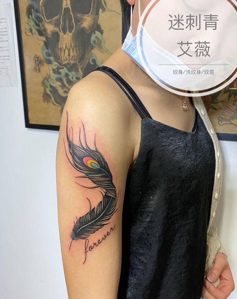 羽毛纹身图片_手臂欧美写实图腾羽毛纹身图案