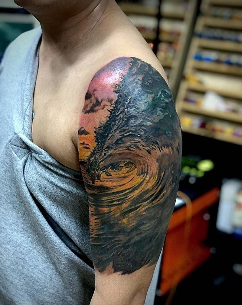 黄昏海浪遮盖纹身图片_手臂欧美写实纹身图案