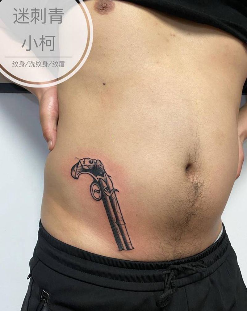 old school手枪纹身图片_腹部Old School女巫枪纹身图案