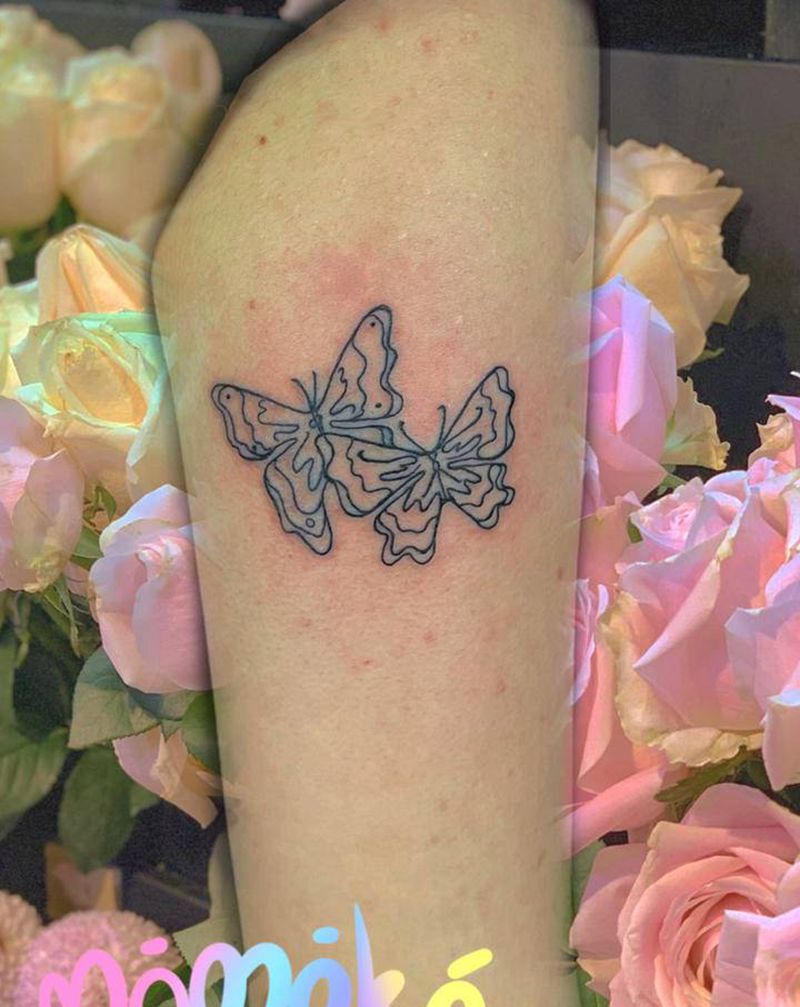 线条蝴蝶纹身图片_手臂几何纹身图案