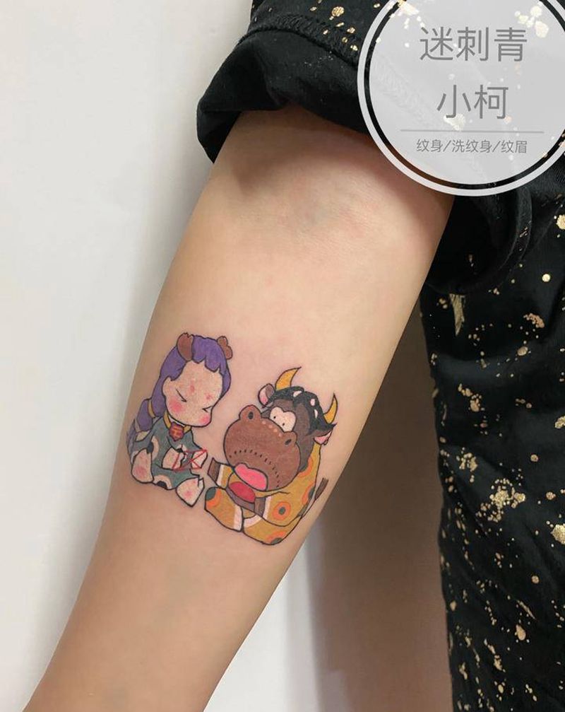 生肖纹身纹身图片_手臂老传统新传统小龙女牛卡通纹身图案