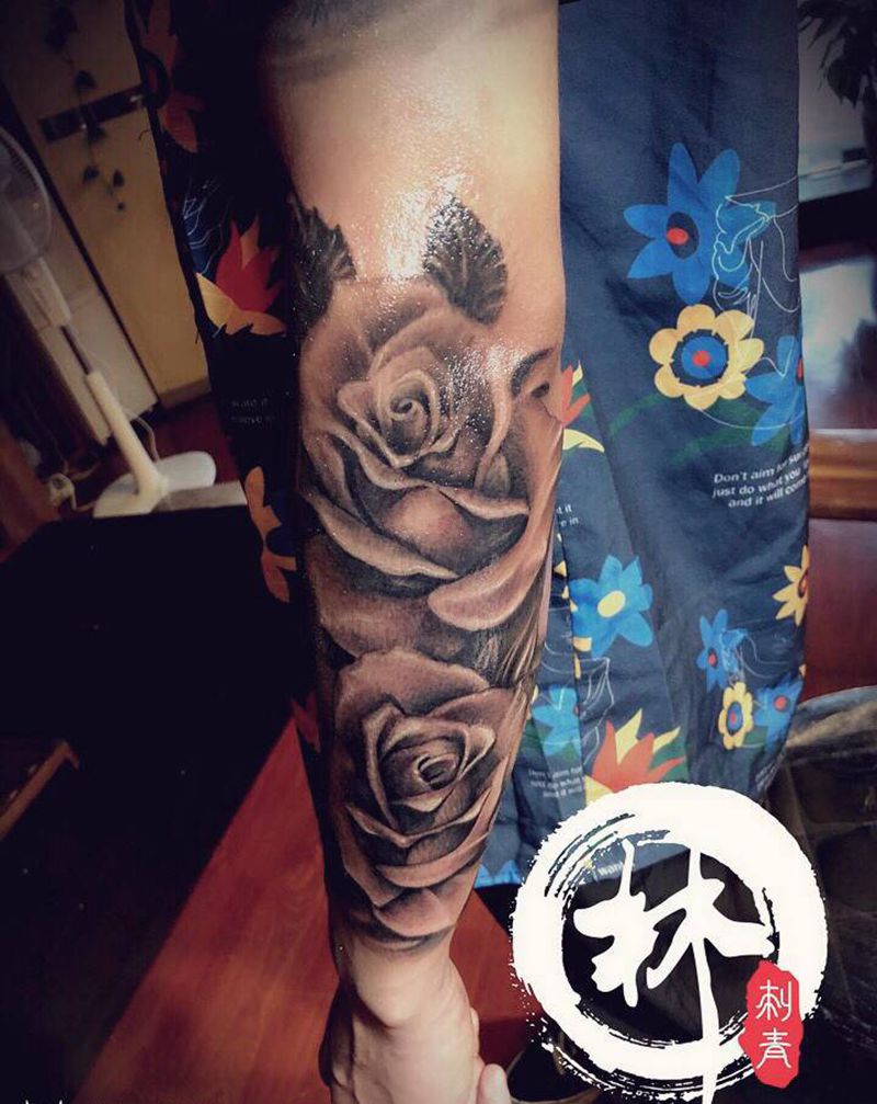 玫瑰纹身图片_手臂欧美写实纹身图案