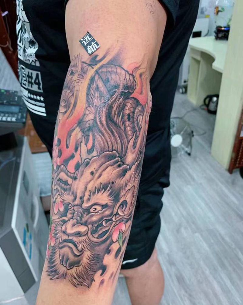 小臂龙纹身纹身图片_手臂老传统手臂龙纹身图案