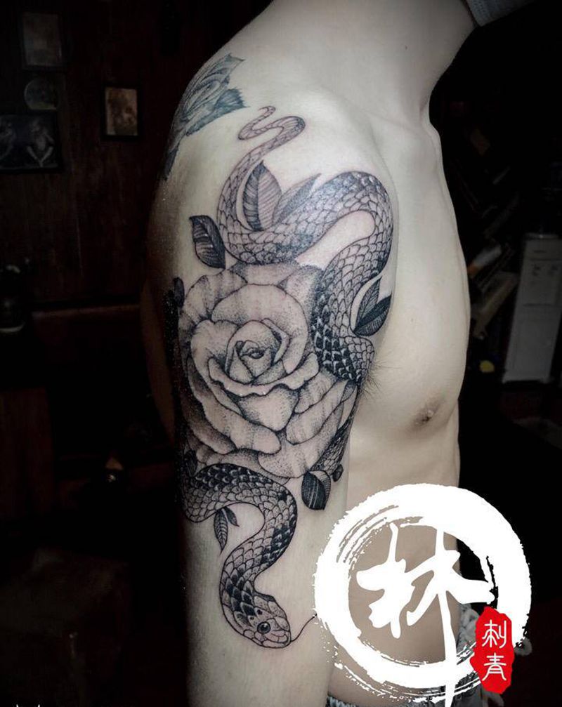 蛇纹身图片_手臂点刺新传统纹身图案