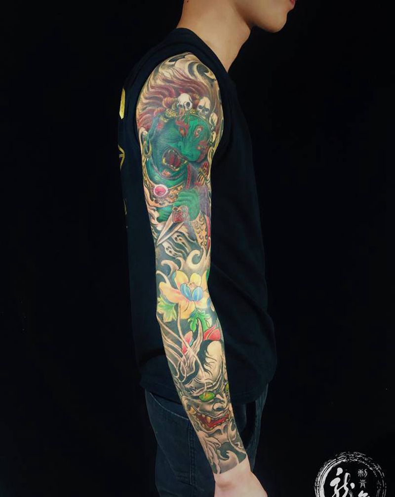 龙舞老铁纹身图片_手臂背部新传统纹身图案