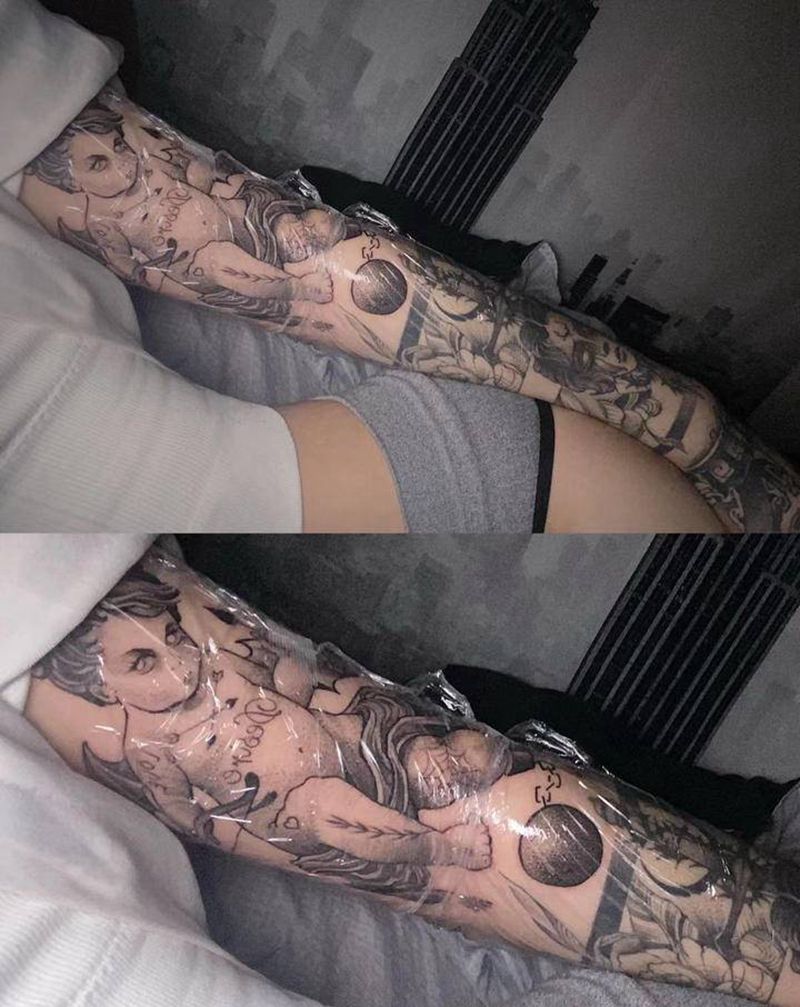 丘比特纹身图片_手臂点刺纹身图案