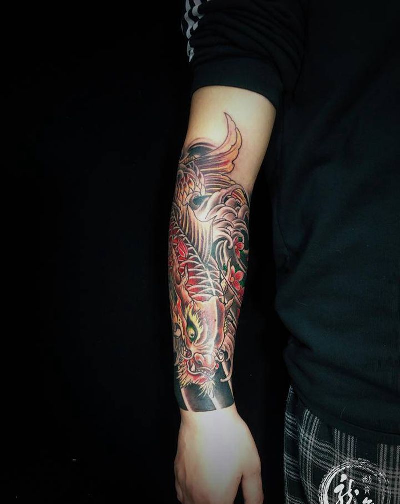 龙鱼纹身图片_手臂新传统纹身图案