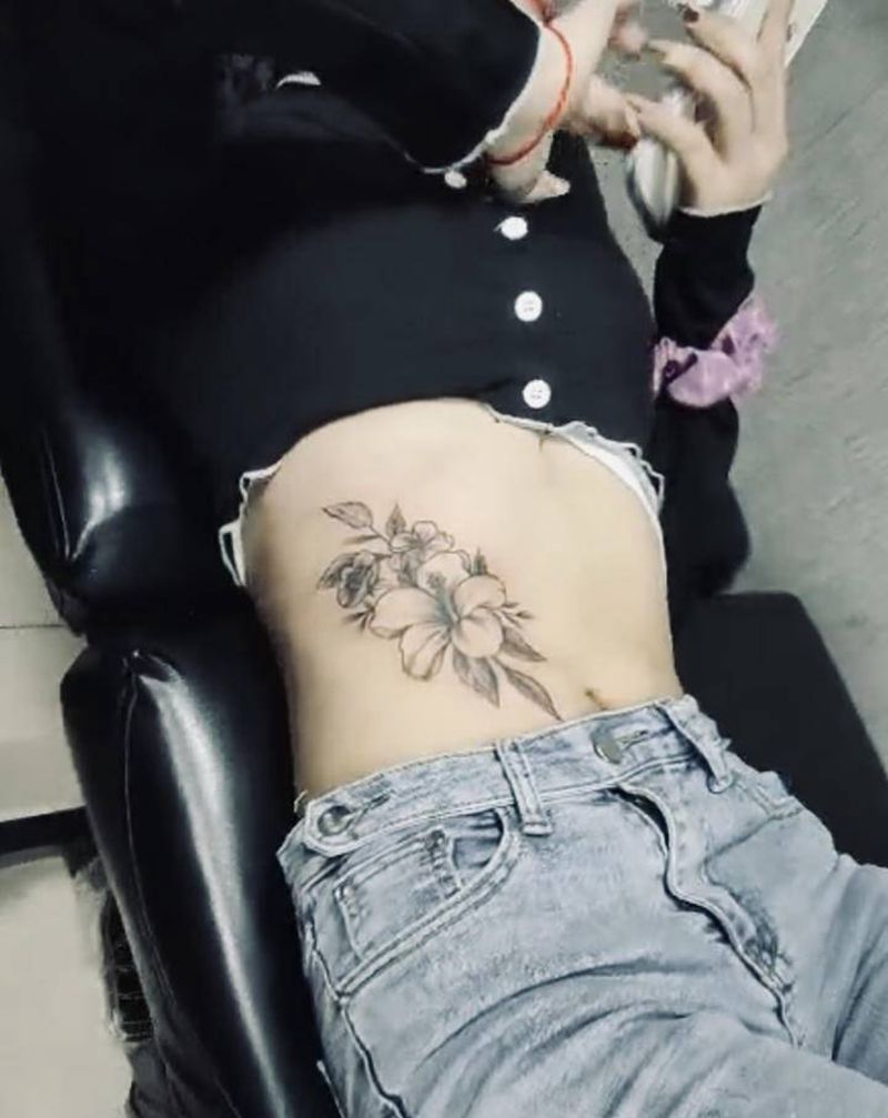 无锡长安.林刺青纹身图片_腰部新传统点刺纹身图案