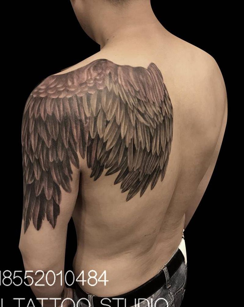 半背翅膀纹身图片_手臂背部纹身图案