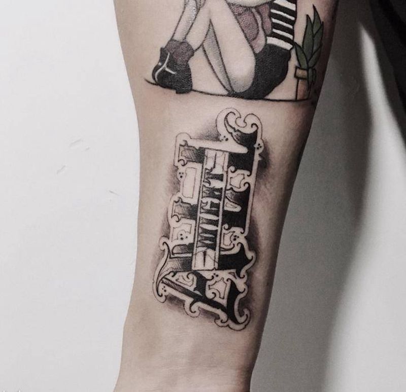 花体字纹身图片_手臂纹身图案