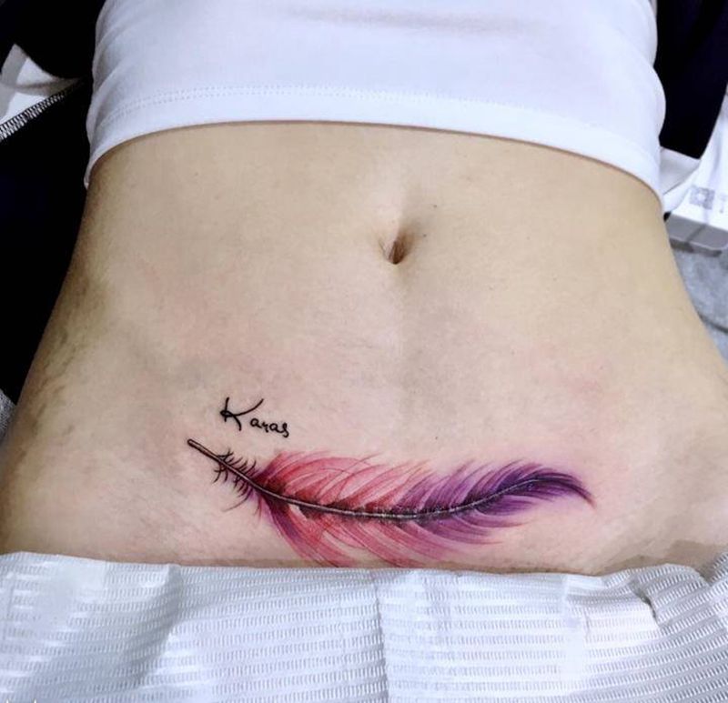 刨妇产遮盖纹身图片_腹部纹身图案