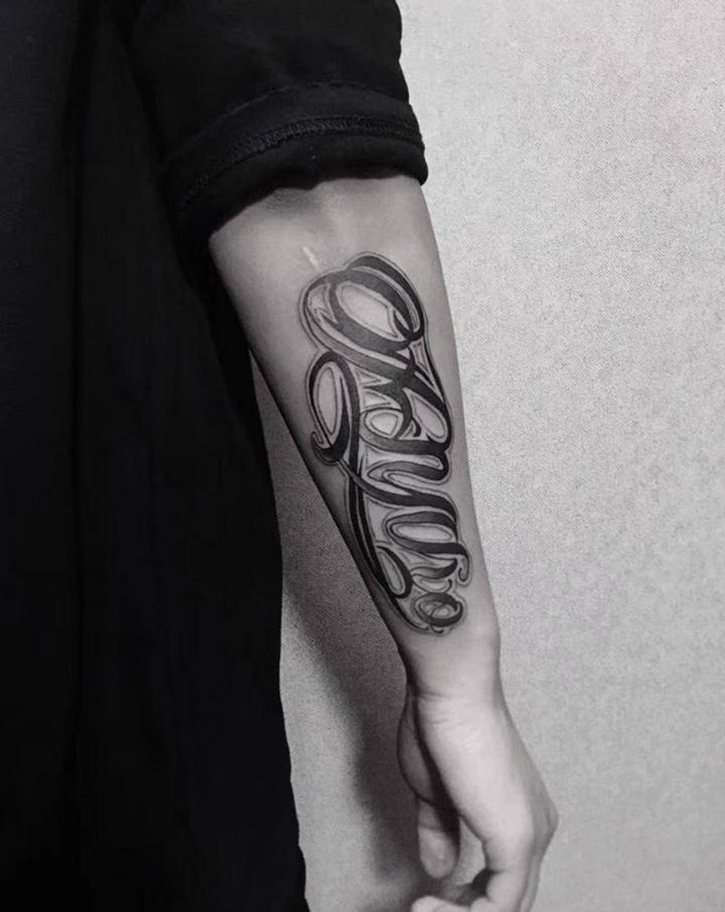 花体字纹身图片_手臂纹身图案