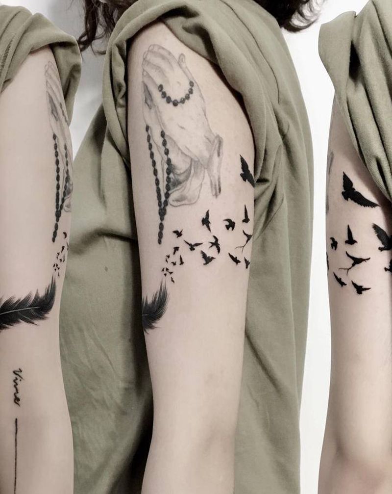 羽毛鸟纹身图片_手臂纹身图案