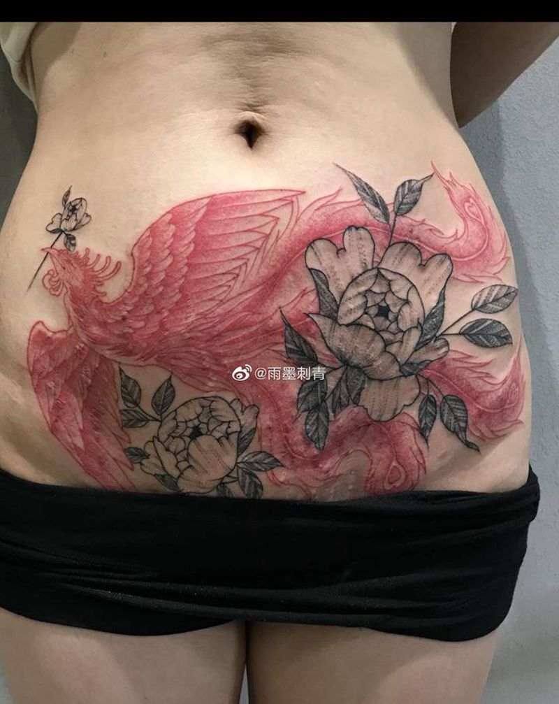 凤戏牡丹纹身图片_腹部腰部新传统点刺纹身图案