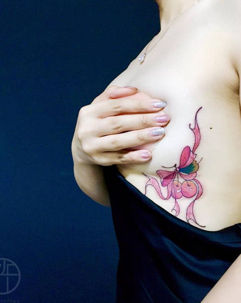 蝴蝶结纹身图片_腹部纹身图案