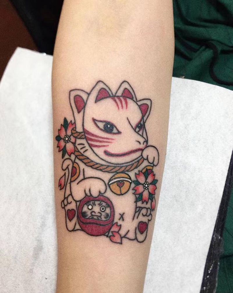 达摩纹身图片_手臂纹身图案