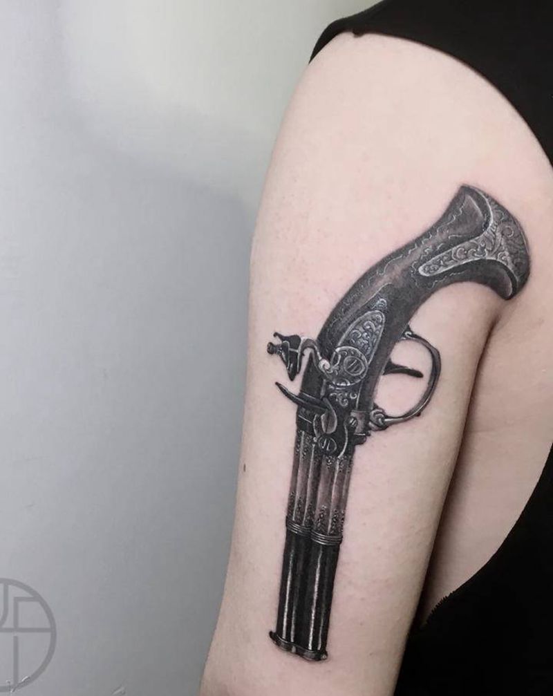 火枪纹身图片_手臂纹身图案