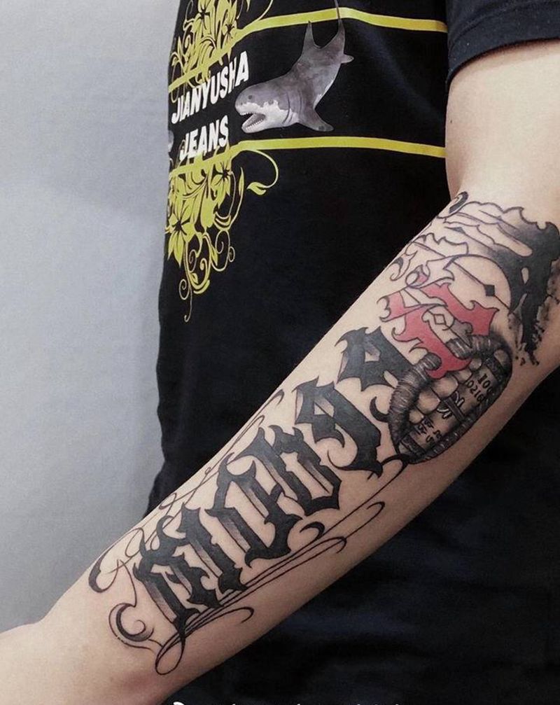 花体字纹身图片_手臂纹身图案