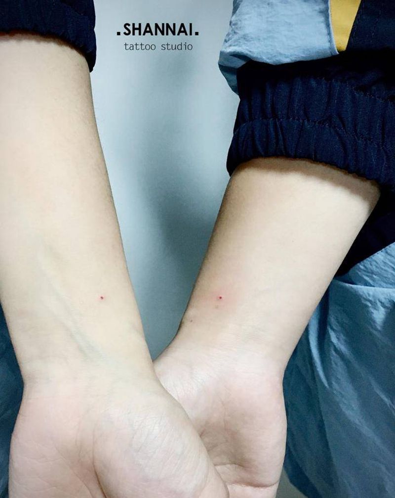 痣纹身图片_手臂纹身图案