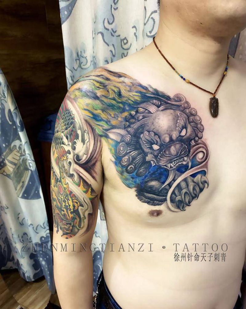 山海经半甲纹身图片_胸部手臂新传统纹身图案