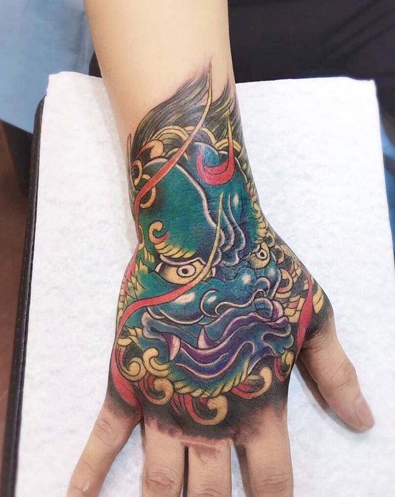 唐狮纹身图片_手部新传统纹身图案