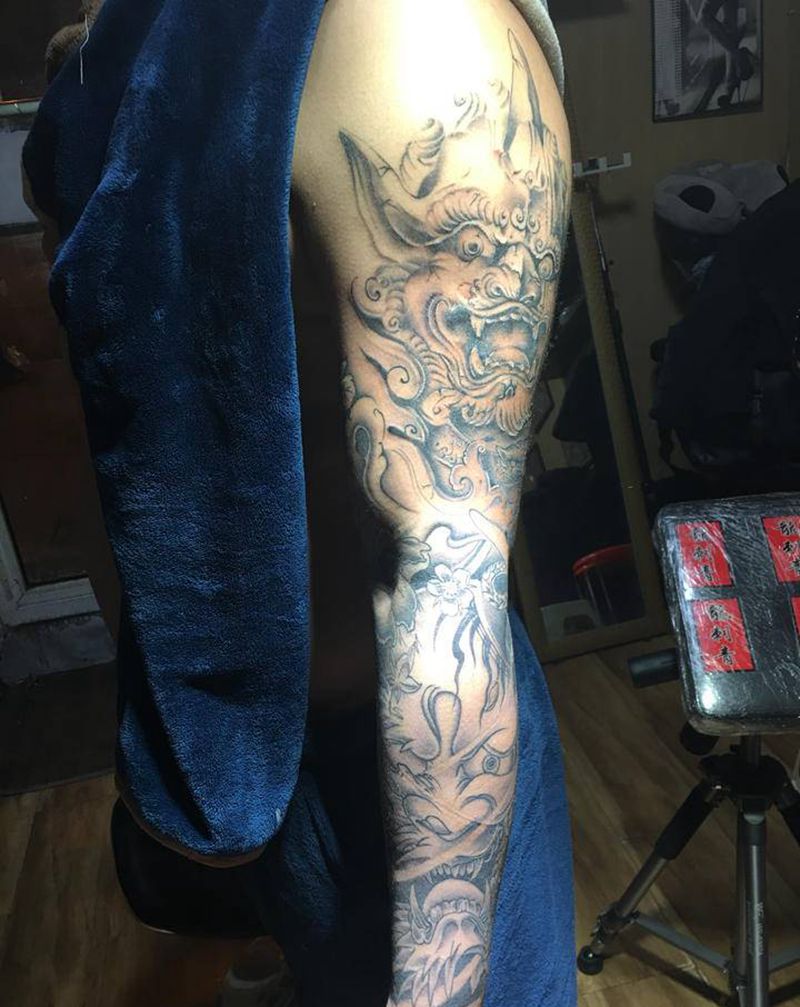 花臂纹身图片_手臂新传统般若唐狮子纹身图案