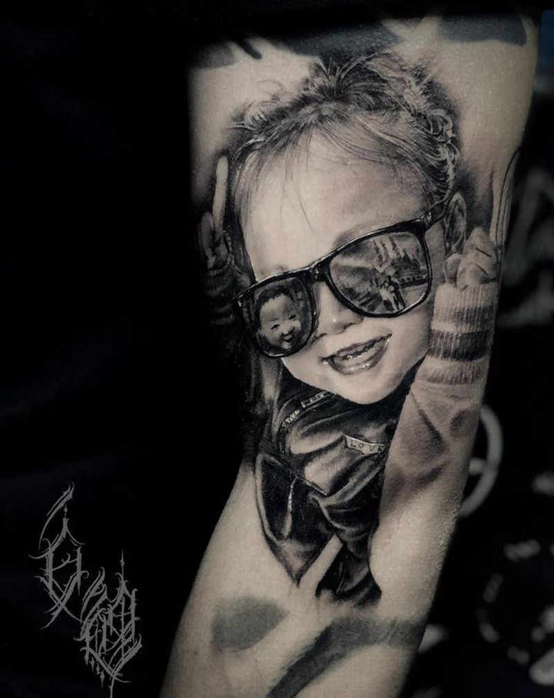 小棉袄纹身图片_手臂欧美写实纹身图案