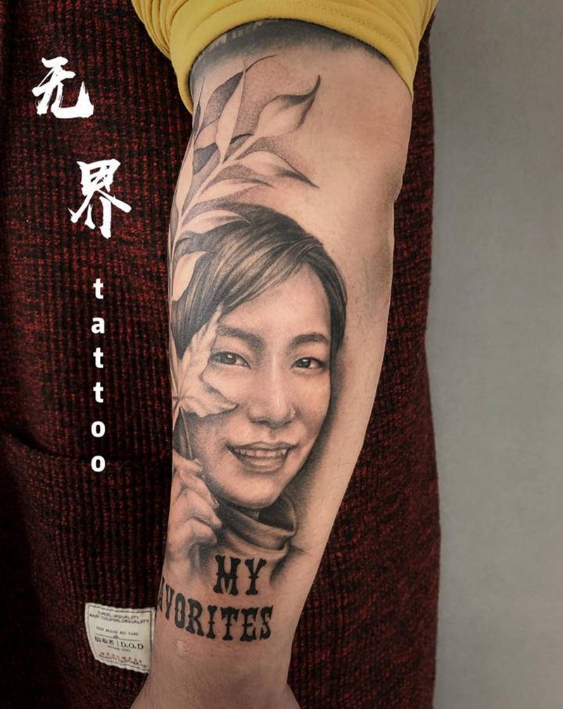 肖像纹身图片_手臂欧美写实肖像人物纹身图案