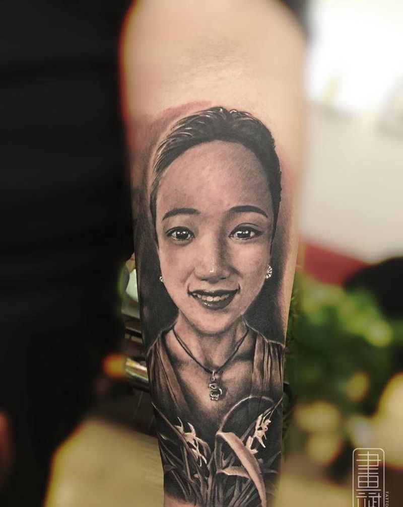 肖像纹身图片_手臂欧美写实肖像兰花纹身图案