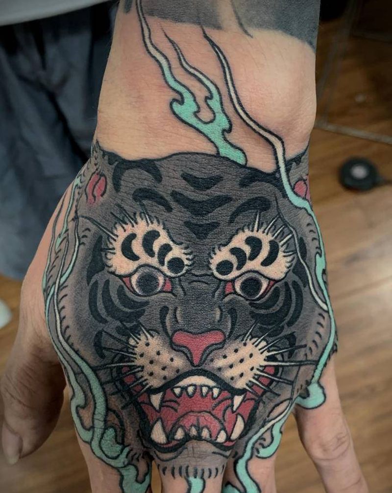 老虎纹身图片_手部老传统纹身图案