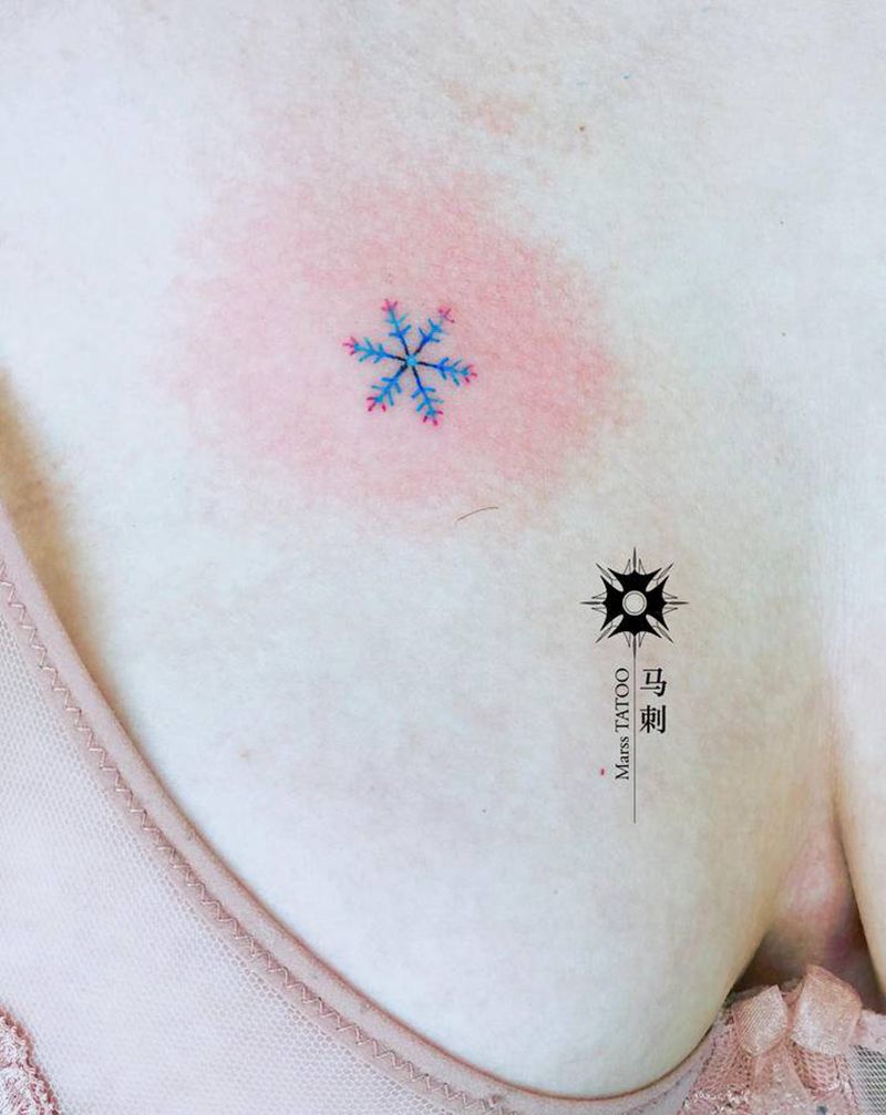 雪花纹身图片_胸部纹身图案