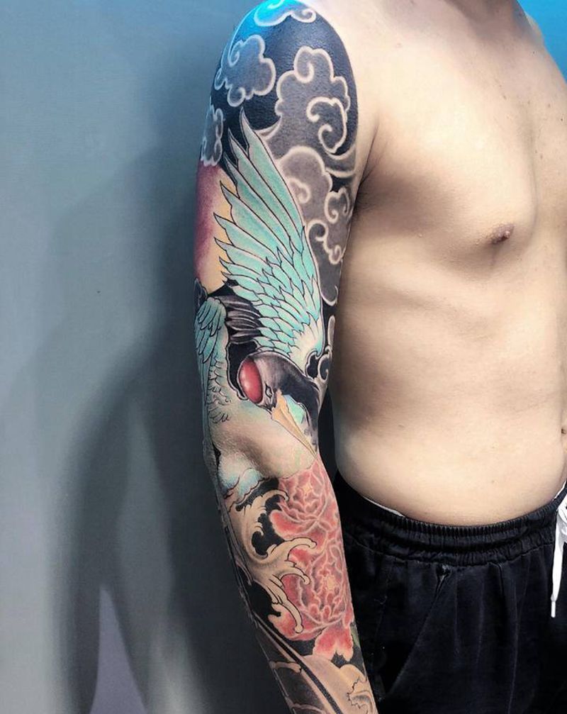 鹤花臂纹身图片_手臂新传统纹身图案