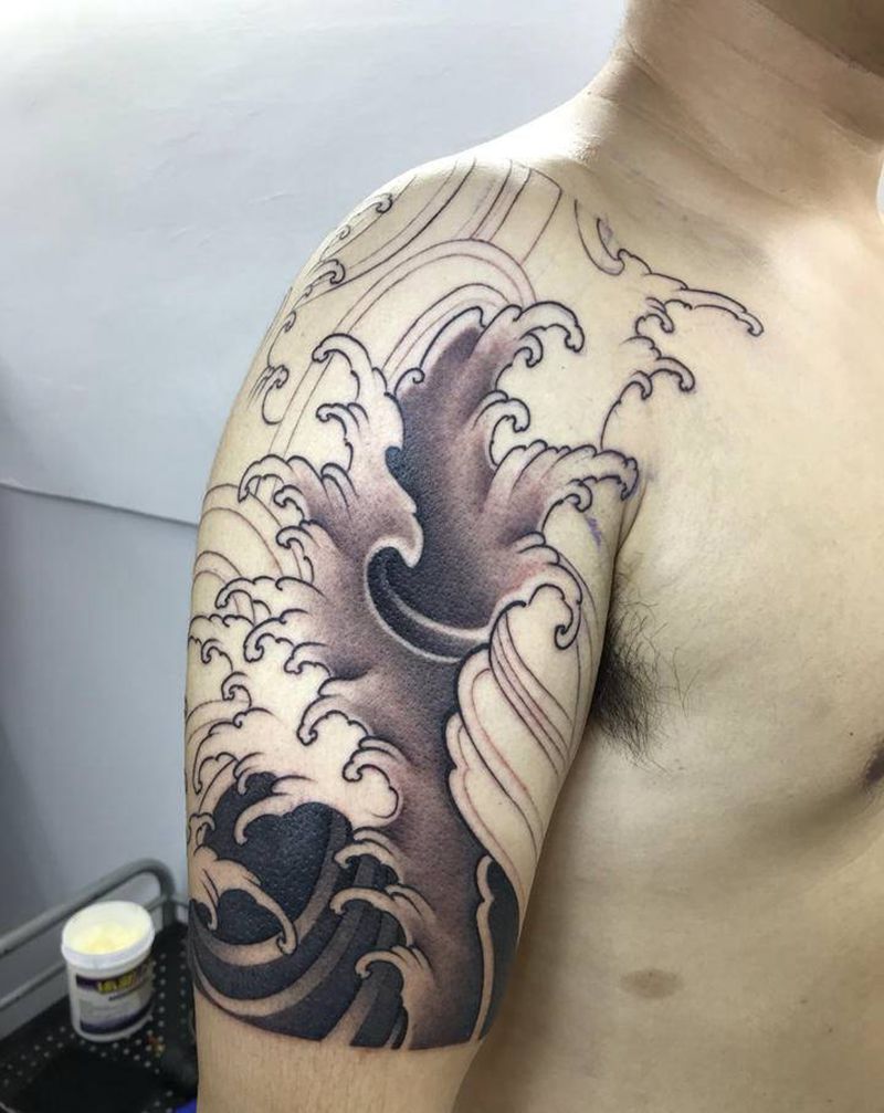 浪臂未完成纹身图片_手臂纹身图案