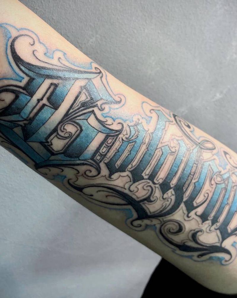 花体字Babycat纹身图片_手臂花体字纹身图案