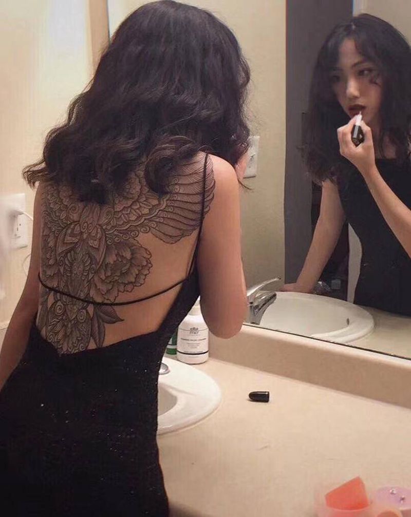 漂洋过海来看你纹身图片_背部几何纹身图案