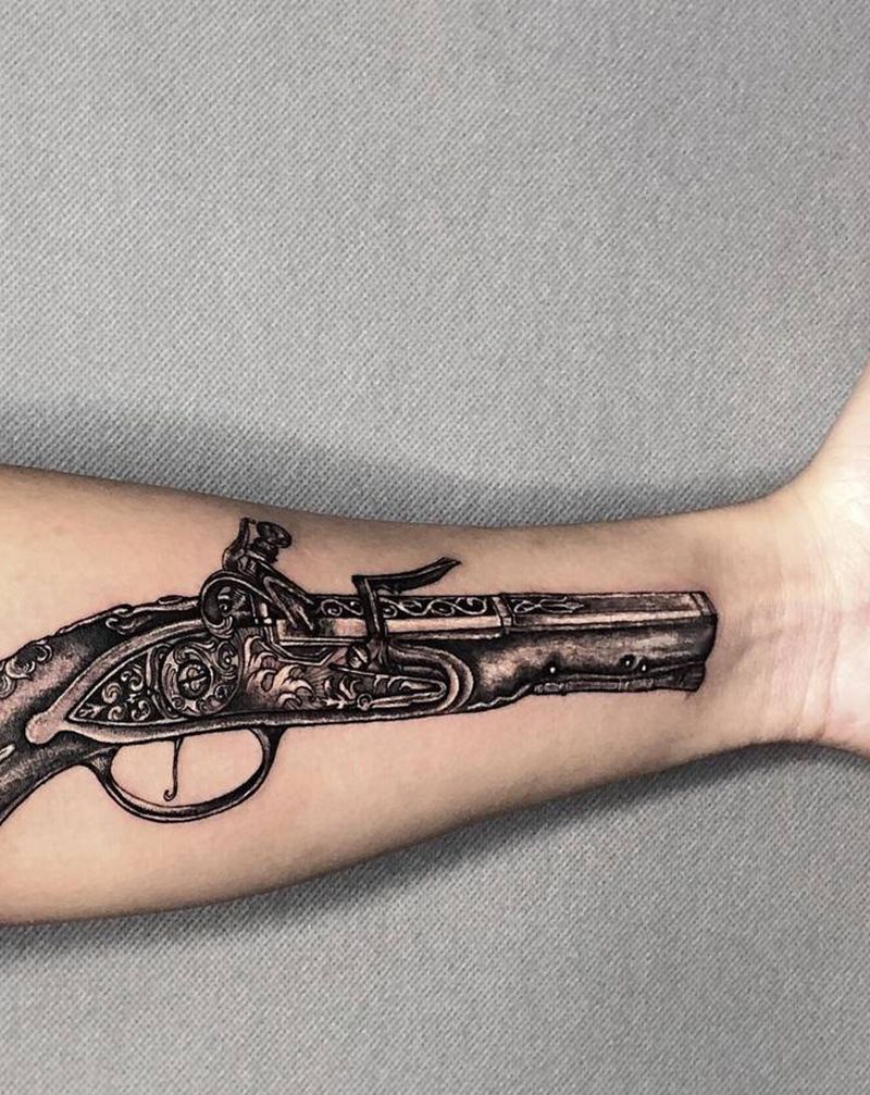 火铳纹身图片_手臂欧美写实纹身图案